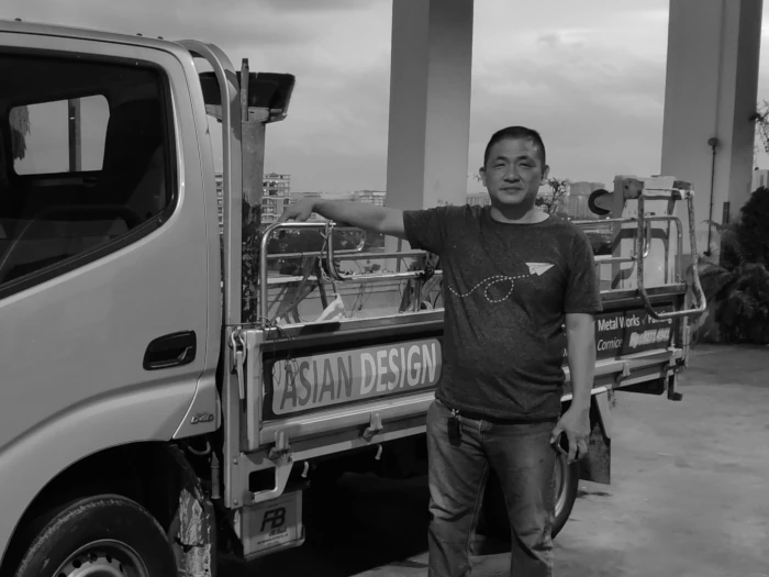 A Plasterceil plaster ceiling contractor in front of truck